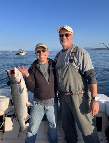 Guide Derek and guest Dave from Kamloops B.C. fishing with Slivers Charters Salmon Sport Fishing with a beautiful Chinook salmon…